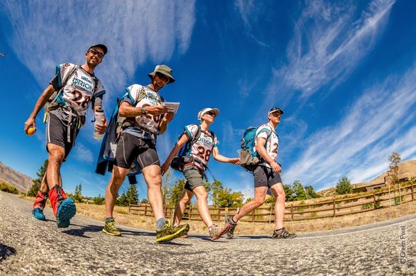 Team 28 Rogue from Australia stride out of the Kayak transition towards the Pisa Range near Cromwell.